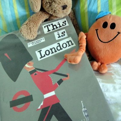 Toys on bed with This is London