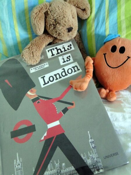 Toys on bed with This is London