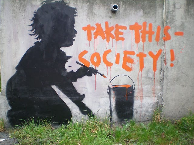 Banksy street art Take This Society 