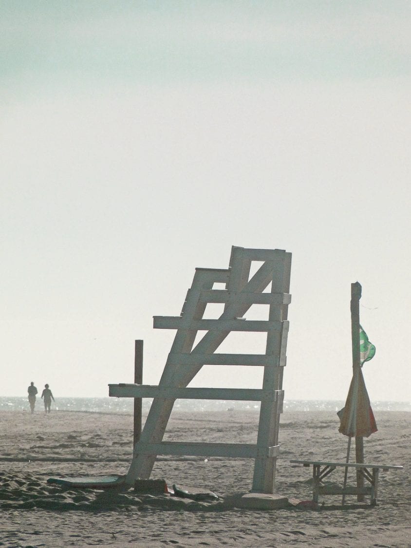 beach walk with kids empty lifeguard chair