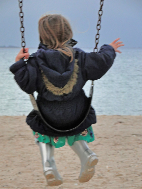 on swing by sea