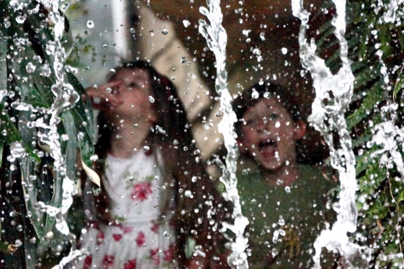 Luce Theo behind Waterfall