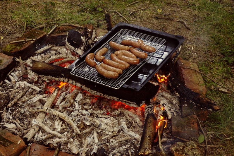 sausages on campfire