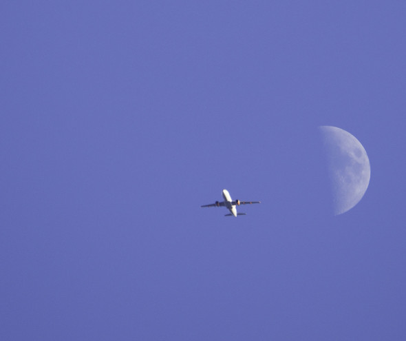 jet passing moon