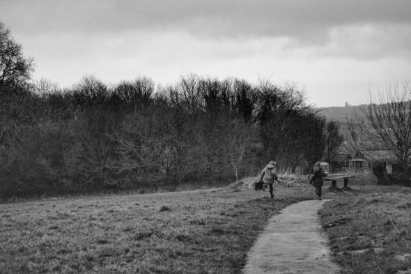 Running on country path bw
