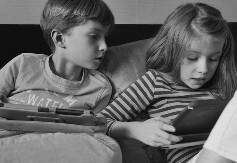 Luce and Theo on sofa