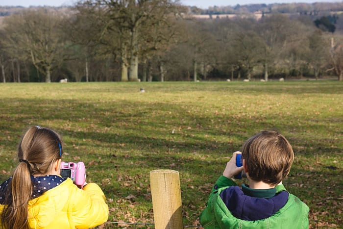 Luce and Theo taking photos