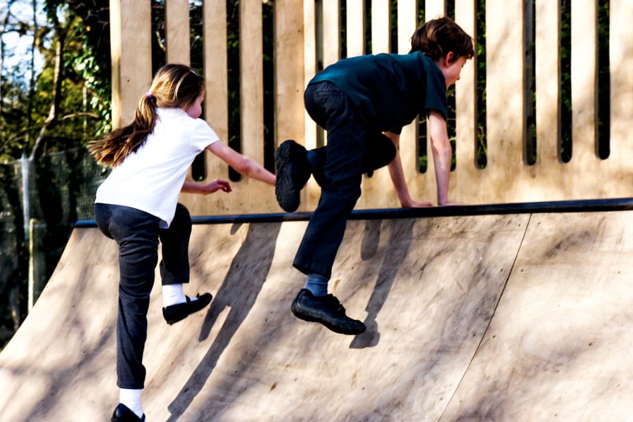 Luce and Theo leaping to top of ramp