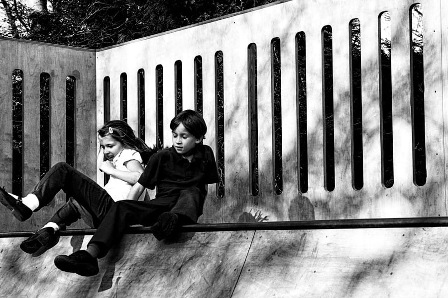 Luce and Theo on skateboard ramp