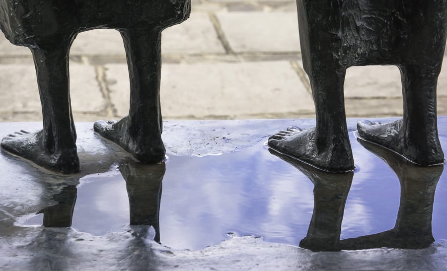 RHS Wisley statue feet and reflection