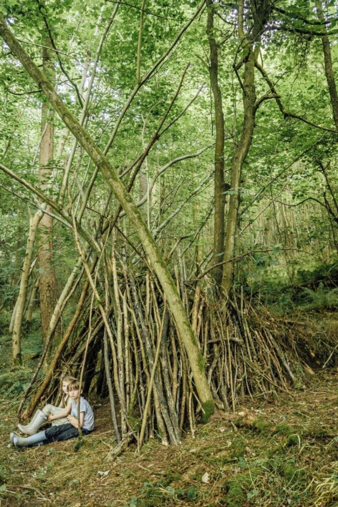 Kids Den building in woods