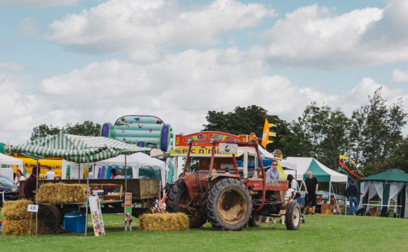 Tractor and stands village fair