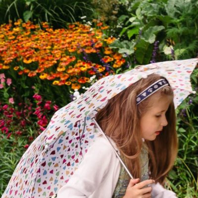 Luce with umbrella in Gravety Garden