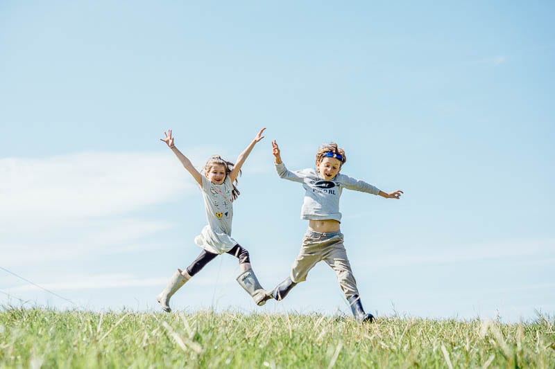 Twins in August leaping