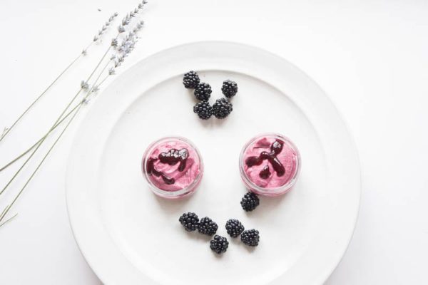 Blackberry fool in pots with fresh berries