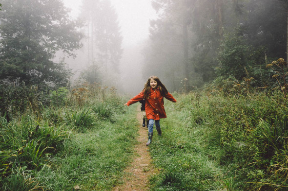 Running on wood path in mist