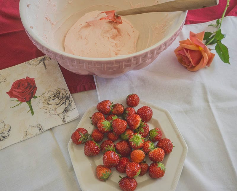 Strawberries and rose buttercream frosting