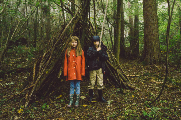 Theo and Luce with den in the woods