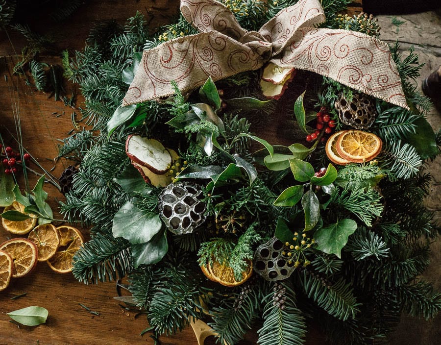 Christmas wreath on table