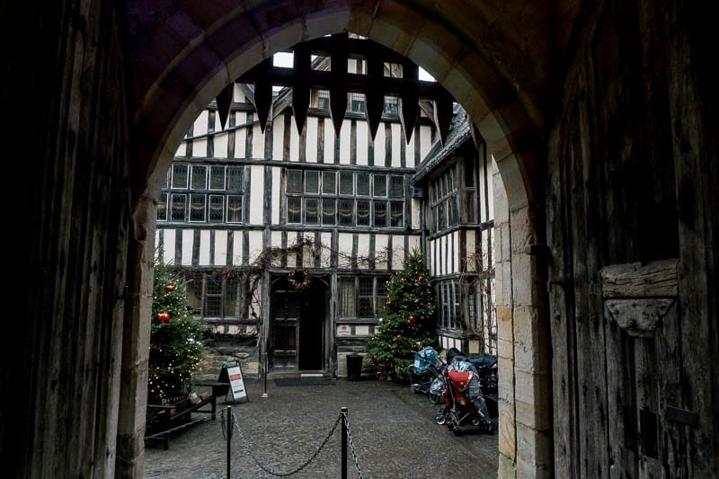 Hever Castle portcullis and strollers