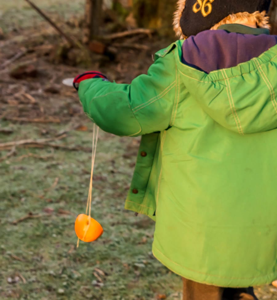 Kids bird watching orange treat