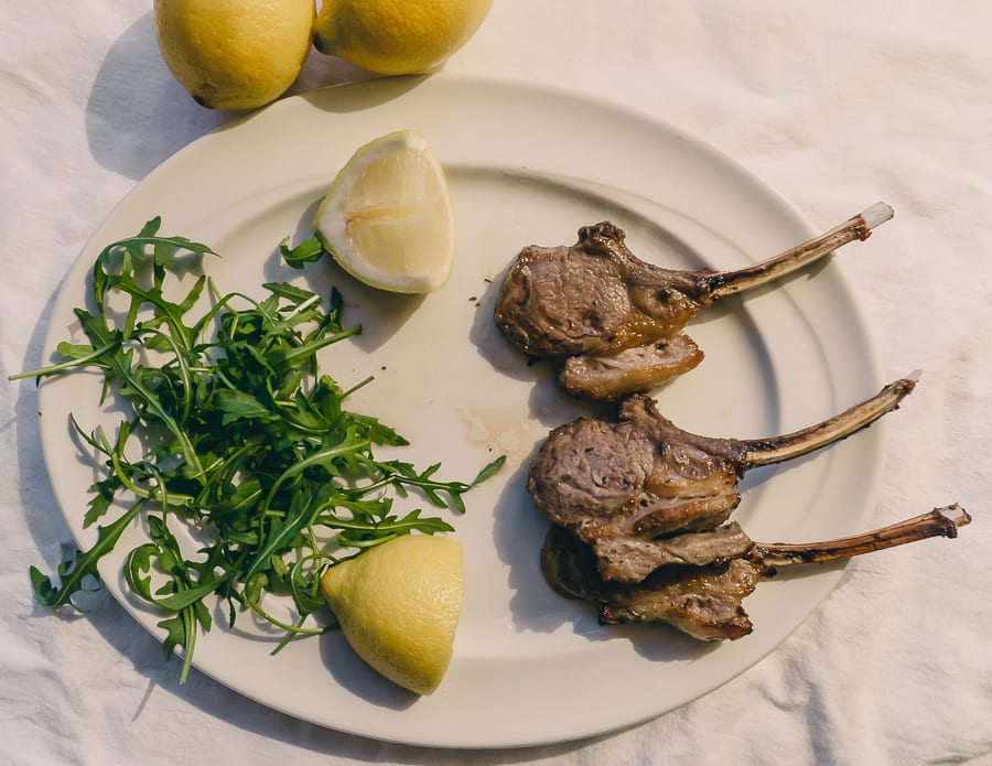 Grilled Lamb Cutlets with lemon and rocket garnish