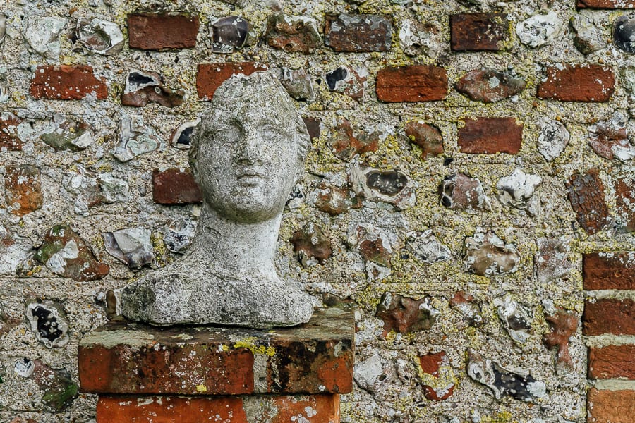 Charleston garden bust against wall