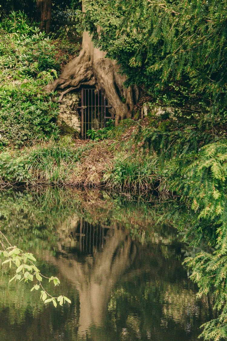 Chiddingstone Castle tree tomb reflection