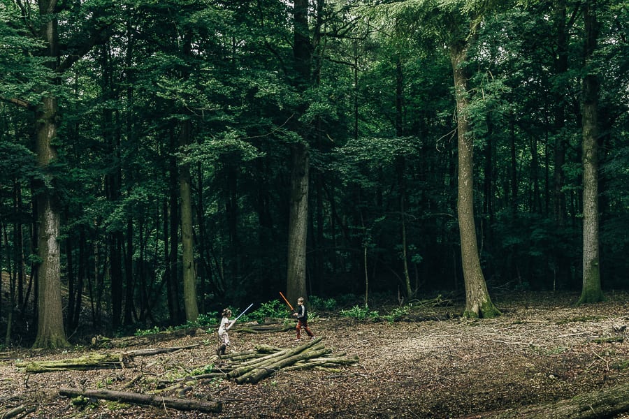 Lightsaber battle in woods kids